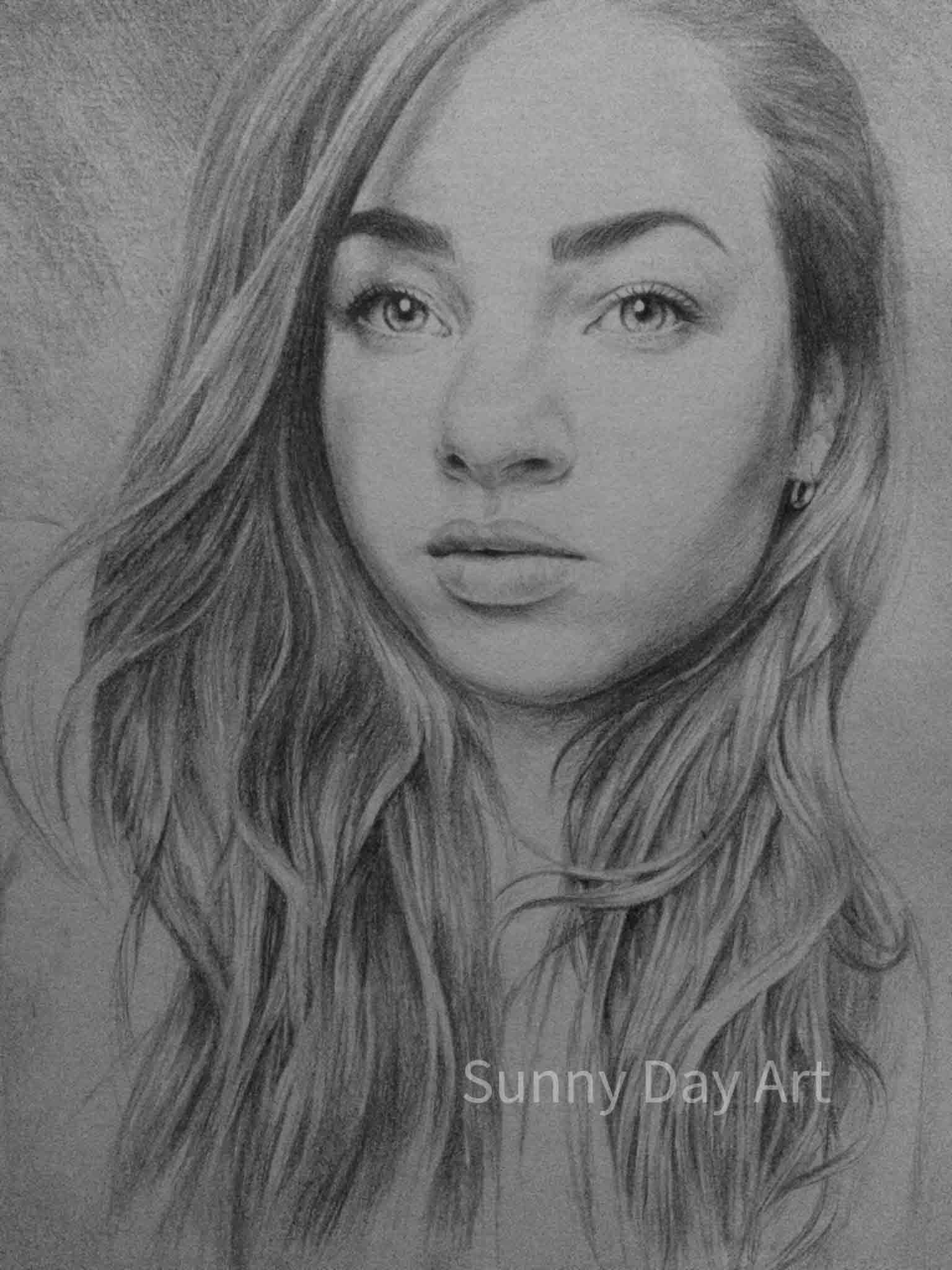 Portrait of a young brunette girl with expressive eyes, full lips, shiny hair.