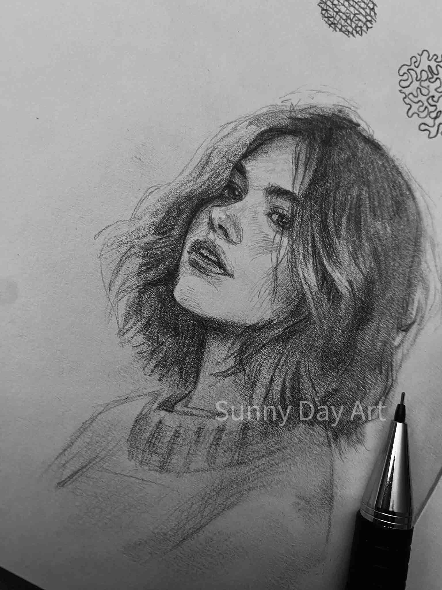 Portrait of a girl with curly hair in a bob haircut, calm expression.