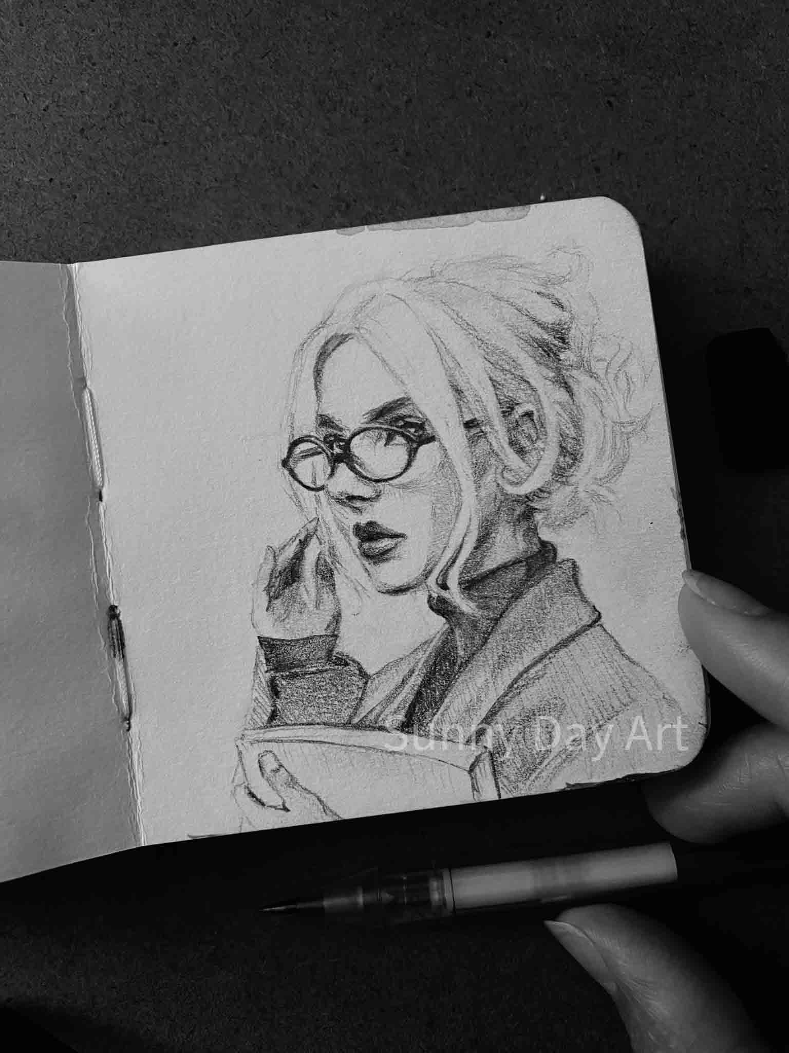 Miniature portrait of a blonde woman in formal attire, wearing glasses.